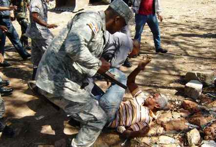 Movilización internacional repudia desalojos violentos en Santo Domingo